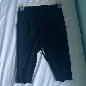 Black ripped capris